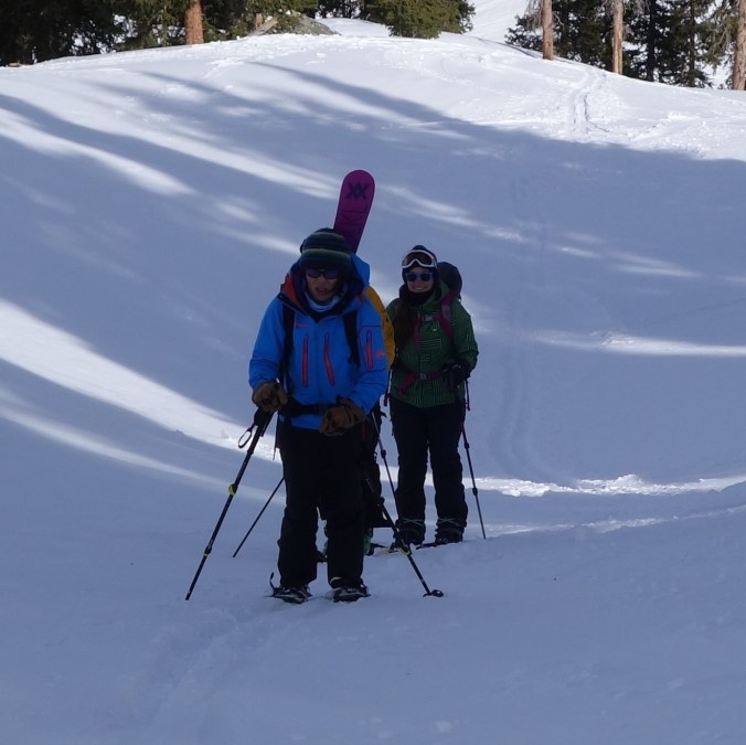 The slog up. You can tell just how happy I am, unlike the picture of misery behind me. 