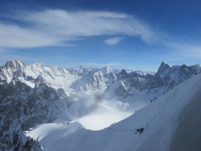 Skiers making their way down the Aig. du Midi ridge